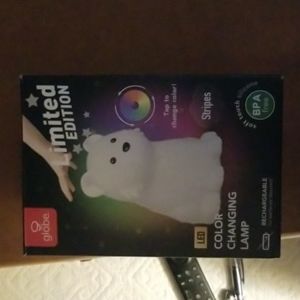 Color changing lamp by globe.  Soft touch silicone. Also rechargeable.